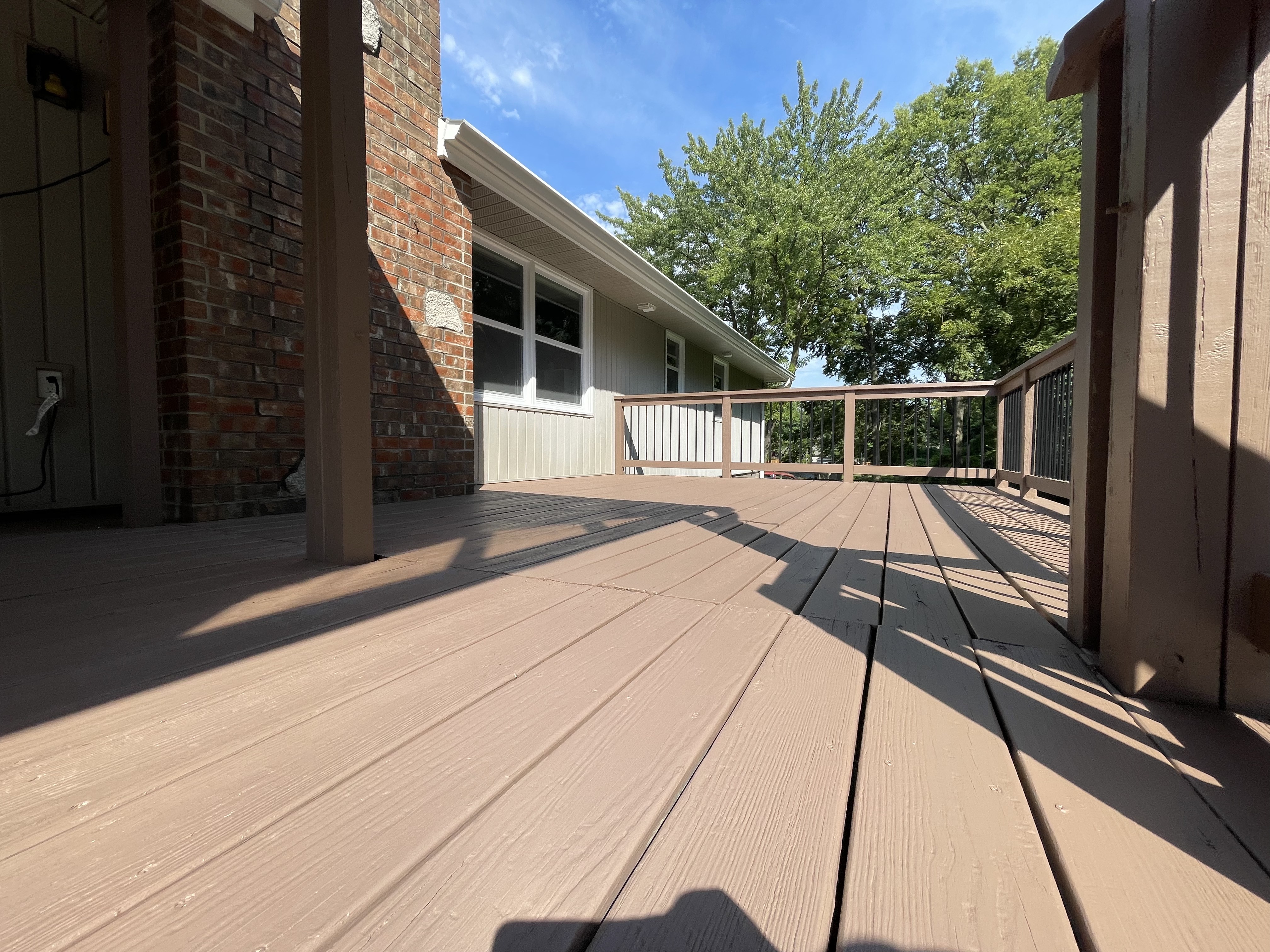 Deck Stain Restoration in Independence, MO by Red Letter Painting