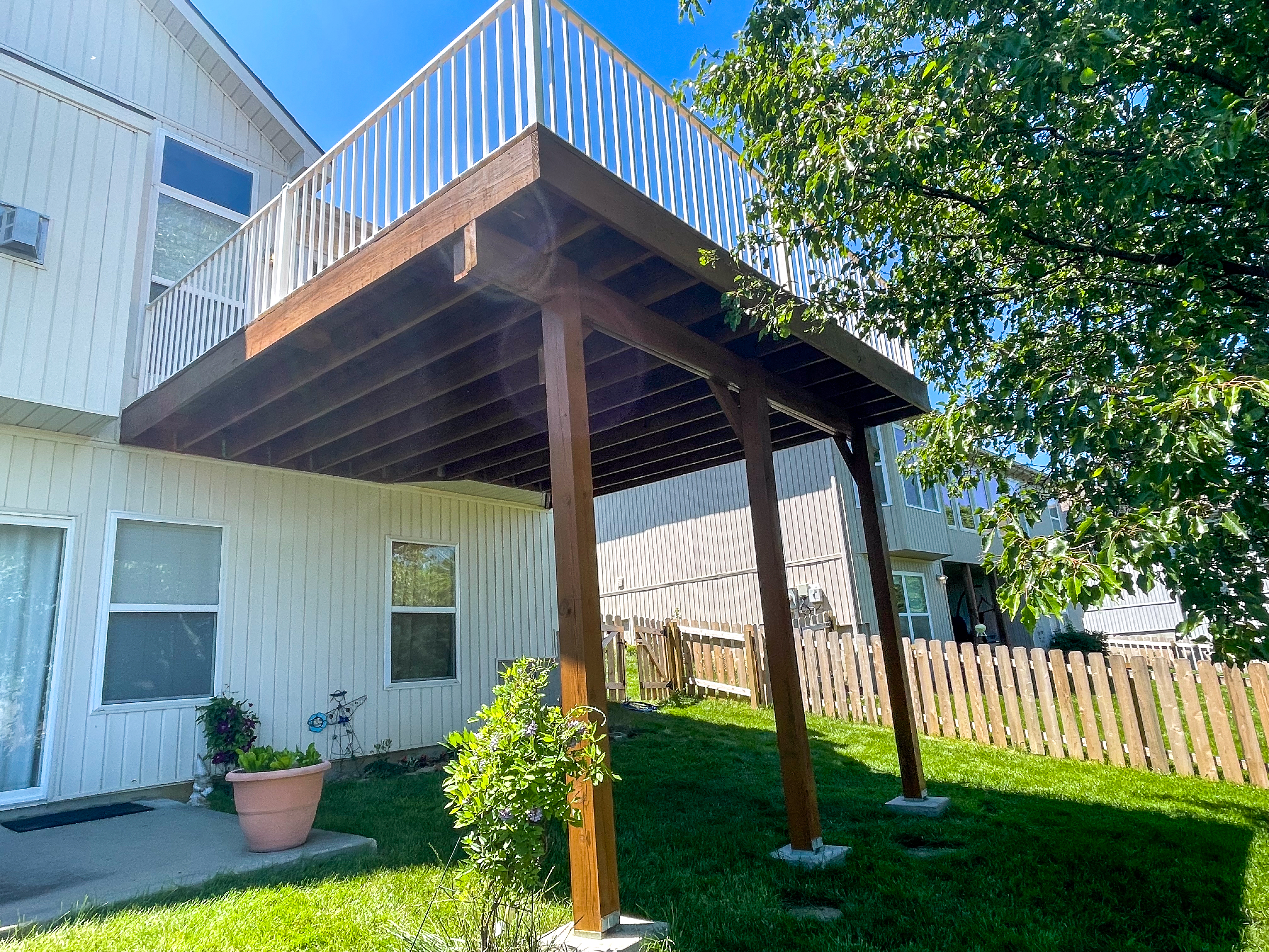 Deck Stain Restoration in Independence, MO by Red Letter Painting