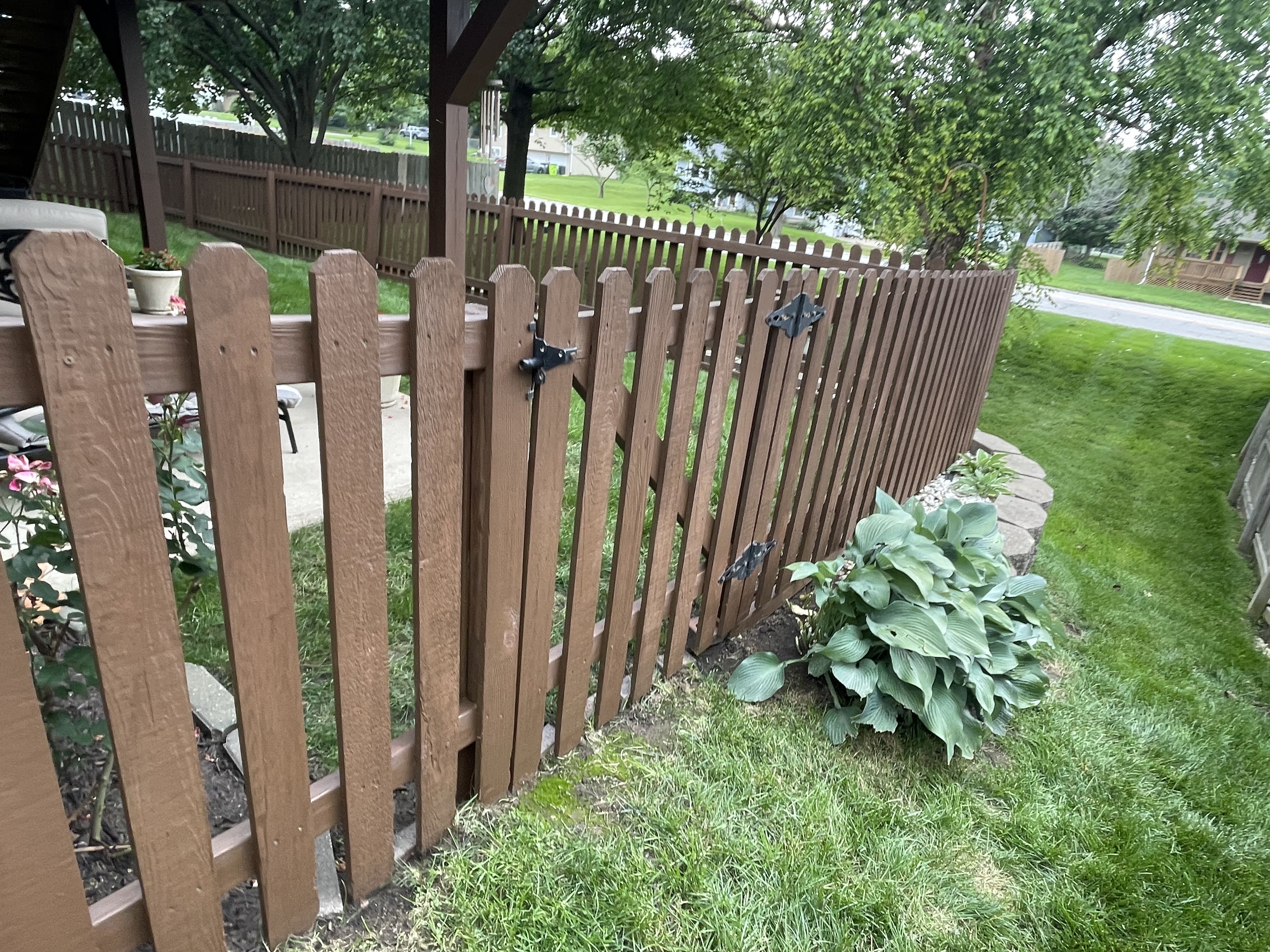 Exterior Staircase & Fence Staining in Belton, MO by Red Letter Painting