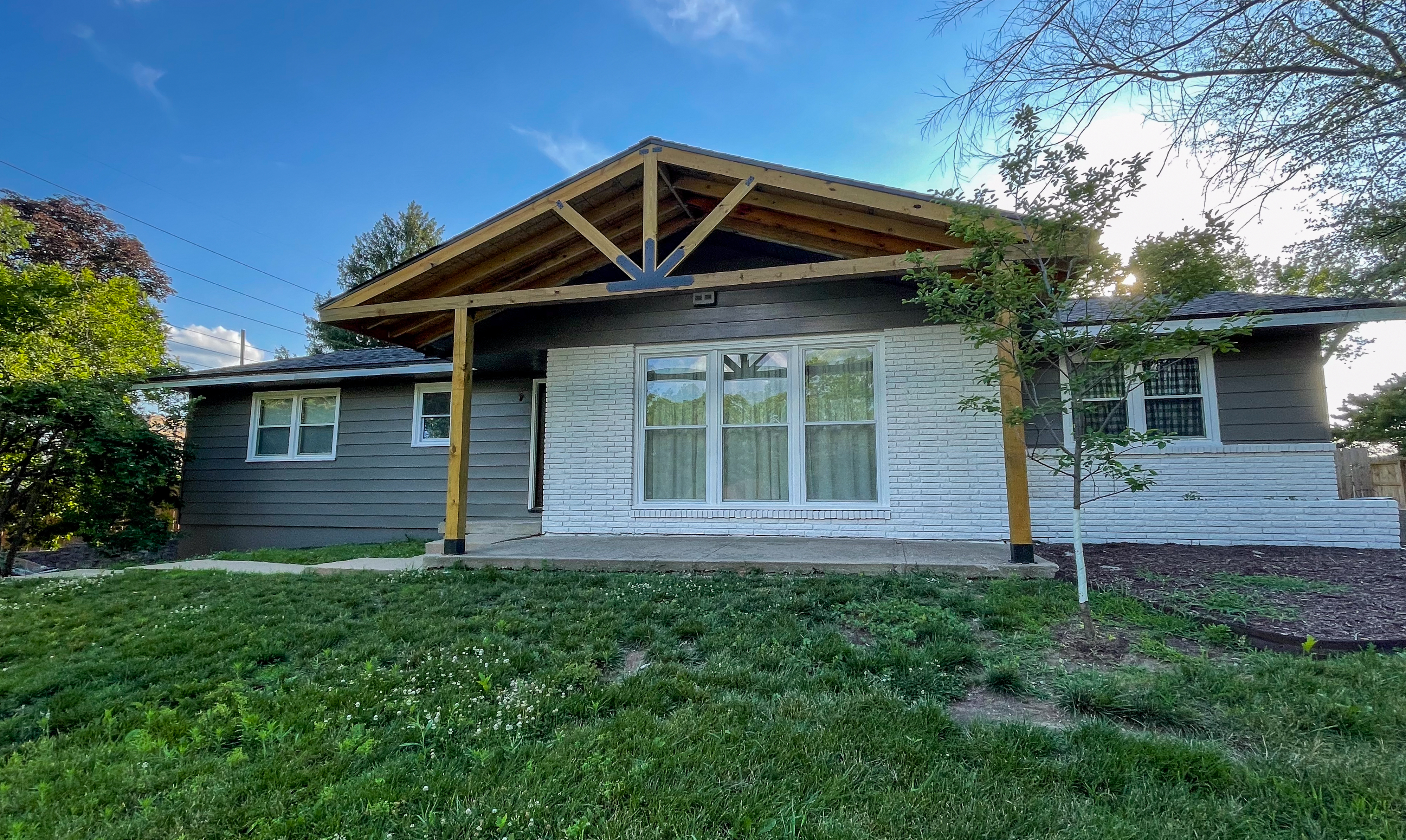 Ranch House Siding and Front Porch Painting in Kansas City, KS by Red Letter Painting