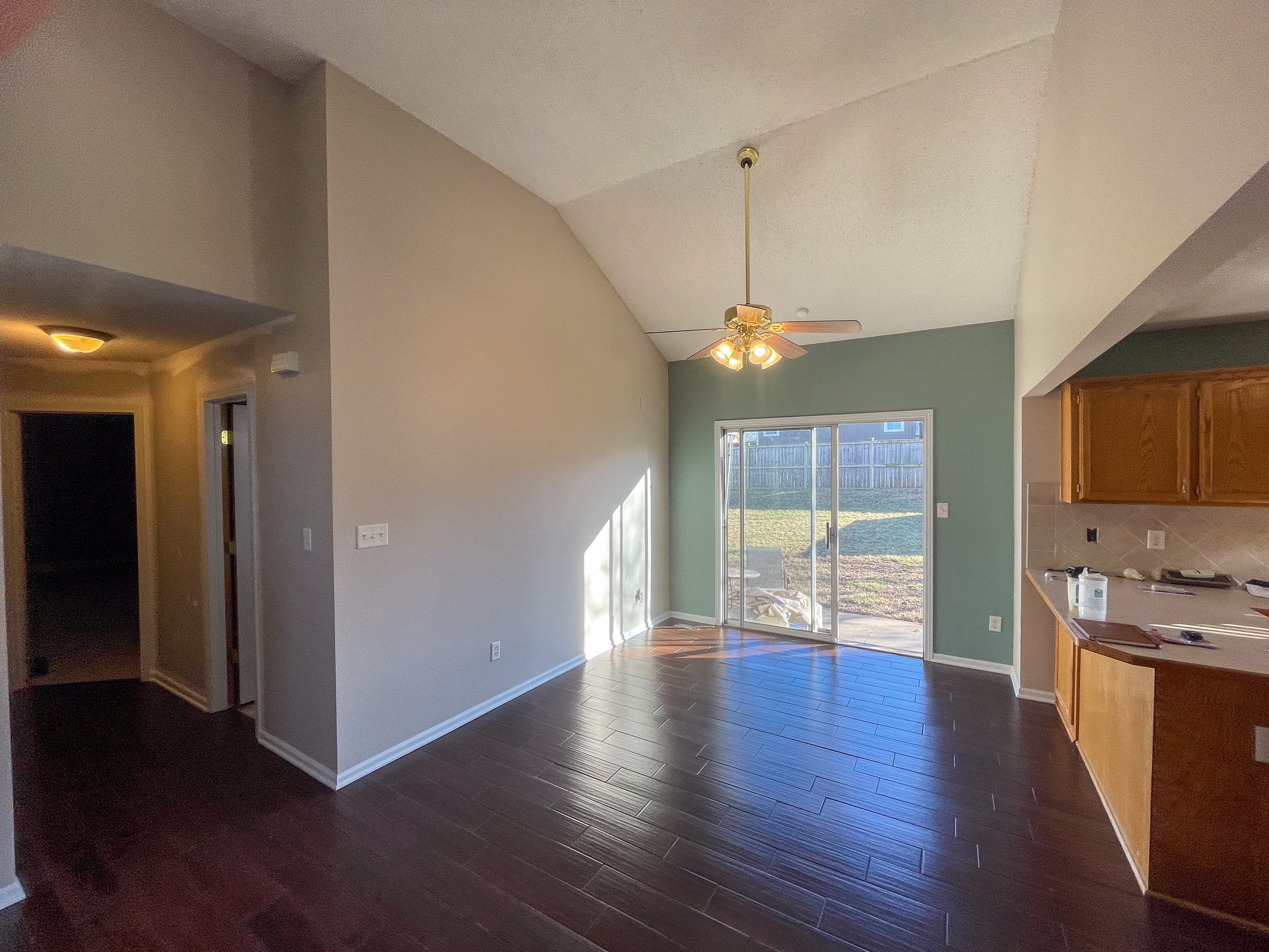 Open Concept Living and Dining Space Painting in Independence, MO by Red Letter Painting
