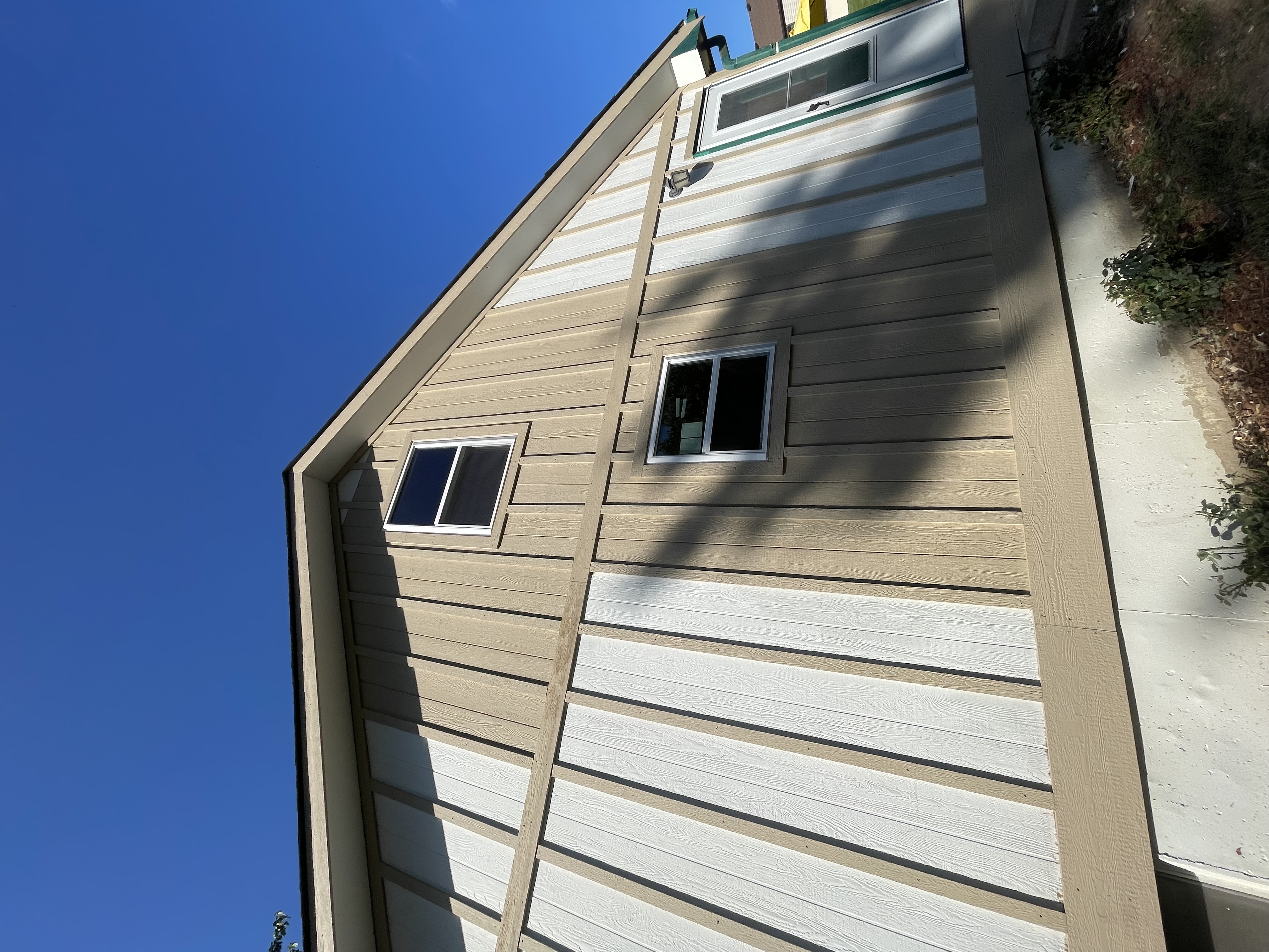 Durable wood rot repair and primed siding replacement in Independence, MO by Red Letter Painting